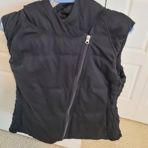 Vest with asymmetrical zipper and hood